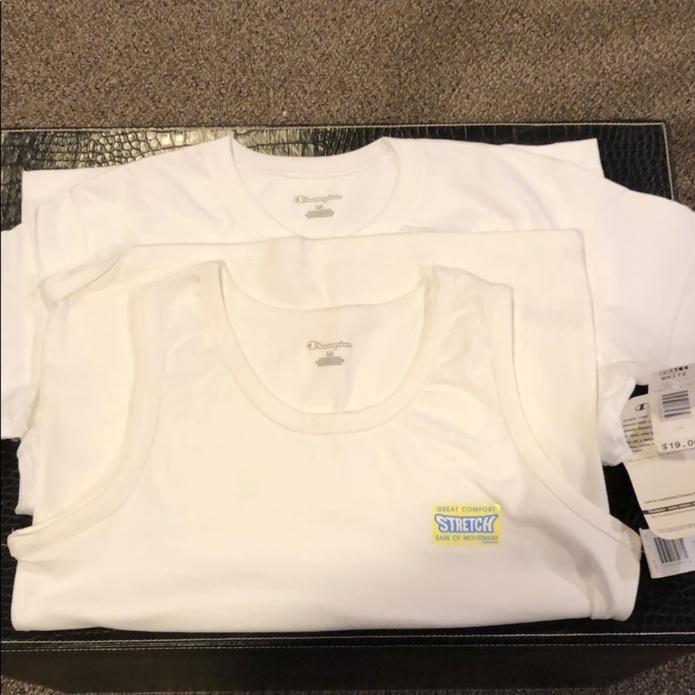 Two Women’s white T-shirts size large. New.